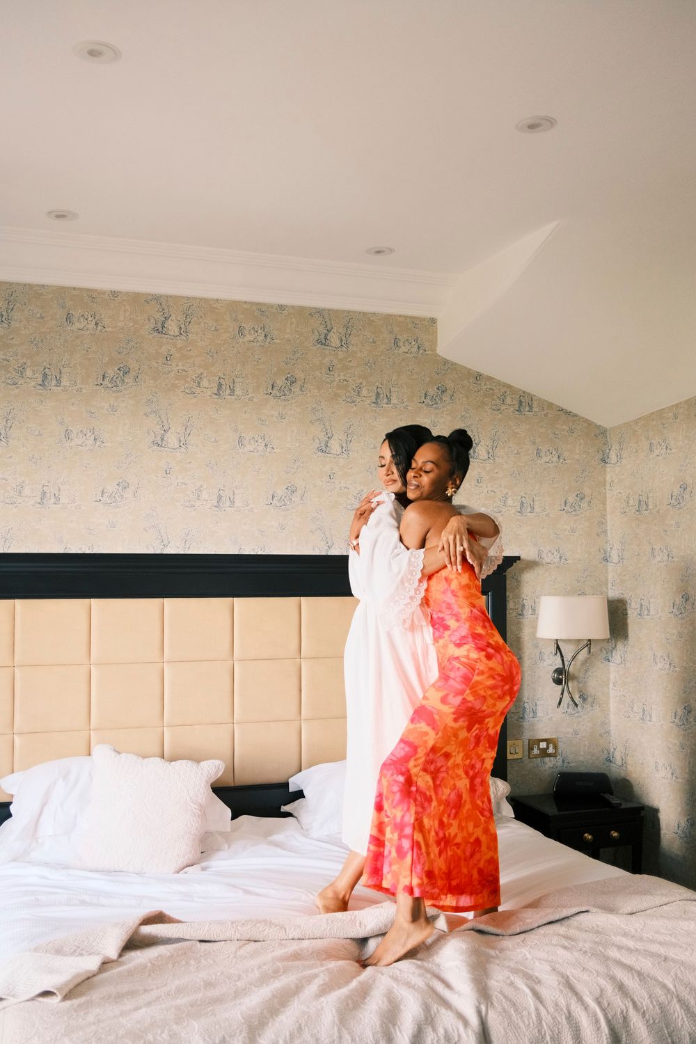 Candid bridal party moments in a luxury suite at The Petersham Hotel