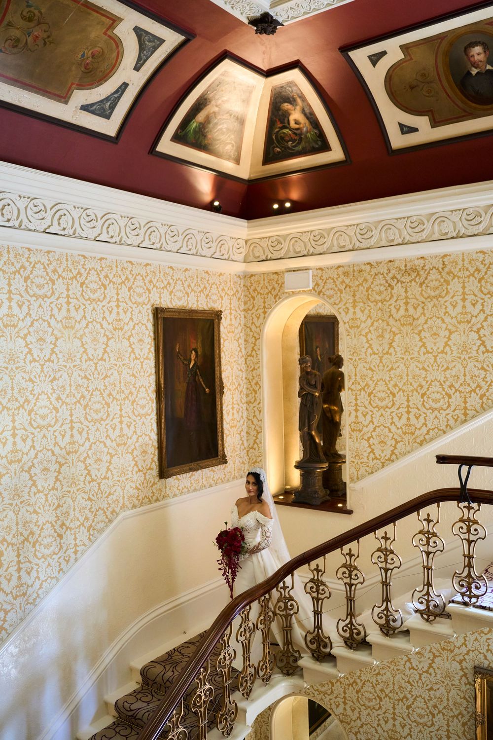 Editorial bridal portrait on the grand staircase at The Petersham Hotel | Luxury Hotel in Richmond, Surrey