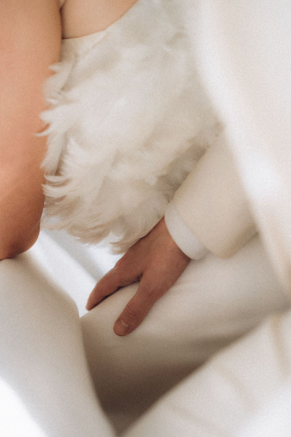 delicate bridal dress detail and hands emotional editorial wedding photography Espoon Kartano