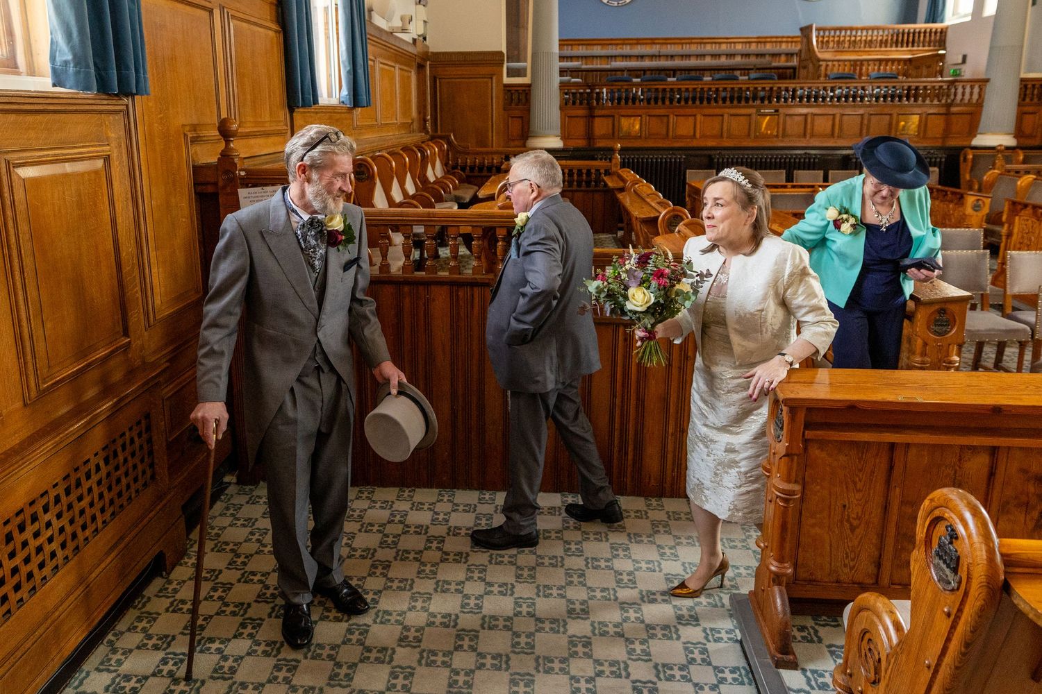 Newly married couple leave Southport Town Hall ceremony together, natural relaxed wedding photography Lancashire