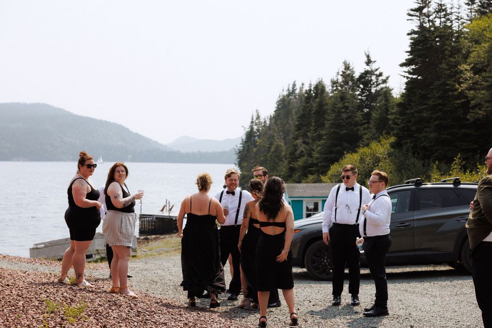Candid bridal party photos in Trinity, Newfoundland captured by Newfoundland documentary style photographer Kaitlyn Yvette