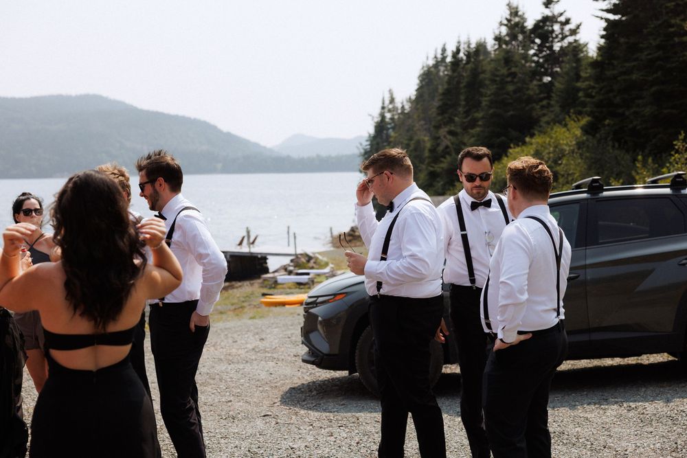 Candid bridal party photos in Trinity, Newfoundland captured by Newfoundland documentary style photographer Kaitlyn Yvette