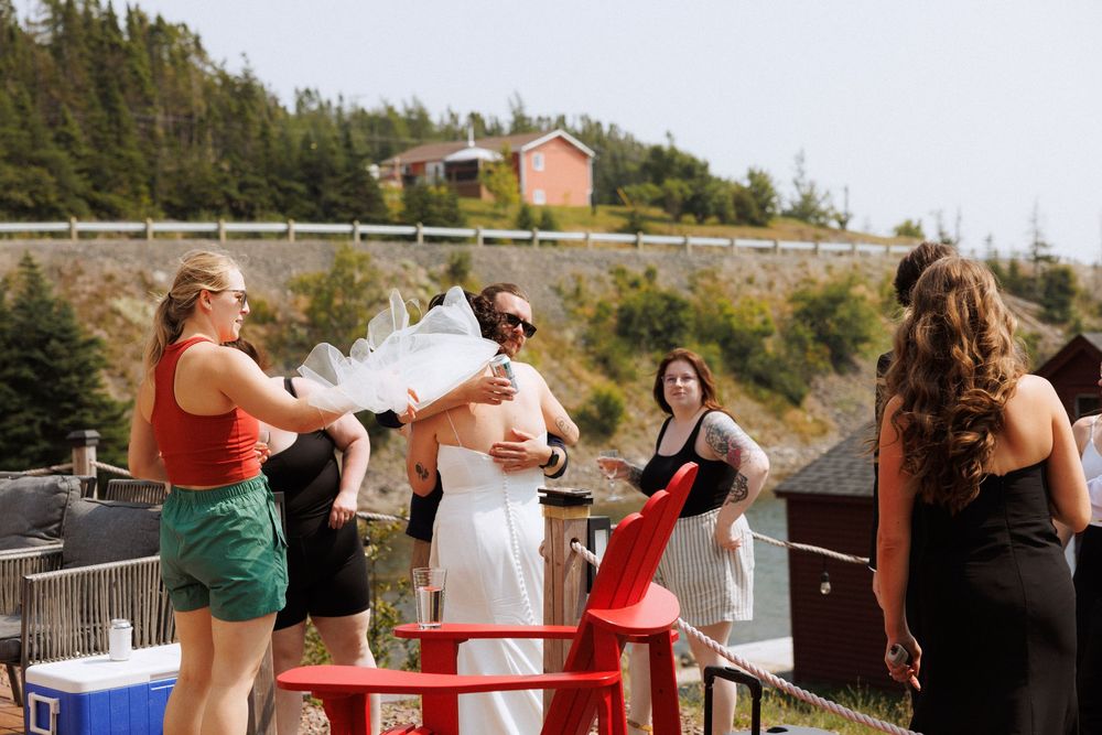 Candid bridal party photos in Trinity, Newfoundland captured by Newfoundland documentary style photographer Kaitlyn Yvette