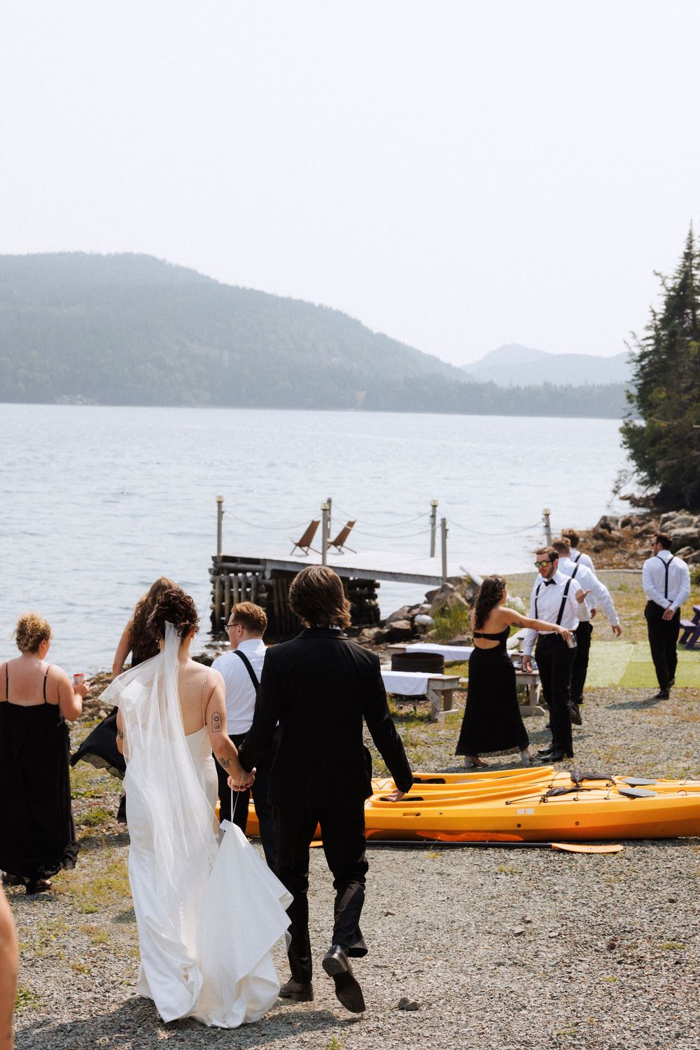 Candid bridal party photos in Trinity, Newfoundland captured by Newfoundland documentary style photographer Kaitlyn Yvette