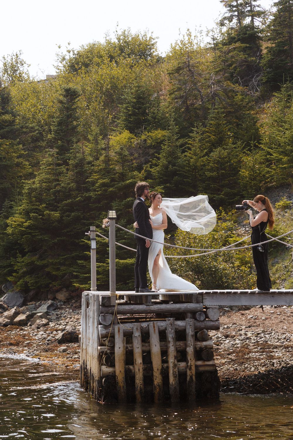 Candid bridal party photos in Trinity, Newfoundland captured by Newfoundland documentary style photographer Kaitlyn Yvette