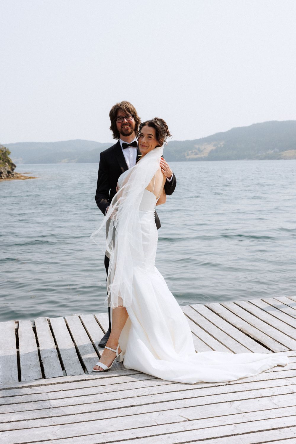 Candid bridal party photos in Trinity, Newfoundland captured by Newfoundland documentary style photographer Kaitlyn Yvette