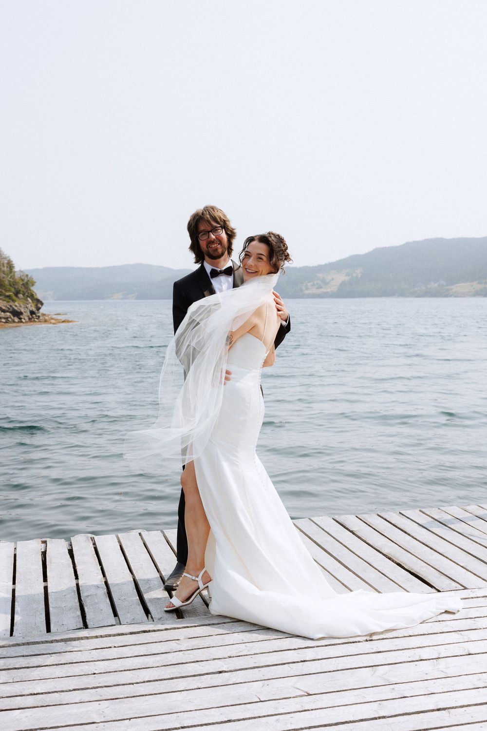 Candid bridal party photos in Trinity, Newfoundland captured by Newfoundland documentary style photographer Kaitlyn Yvette