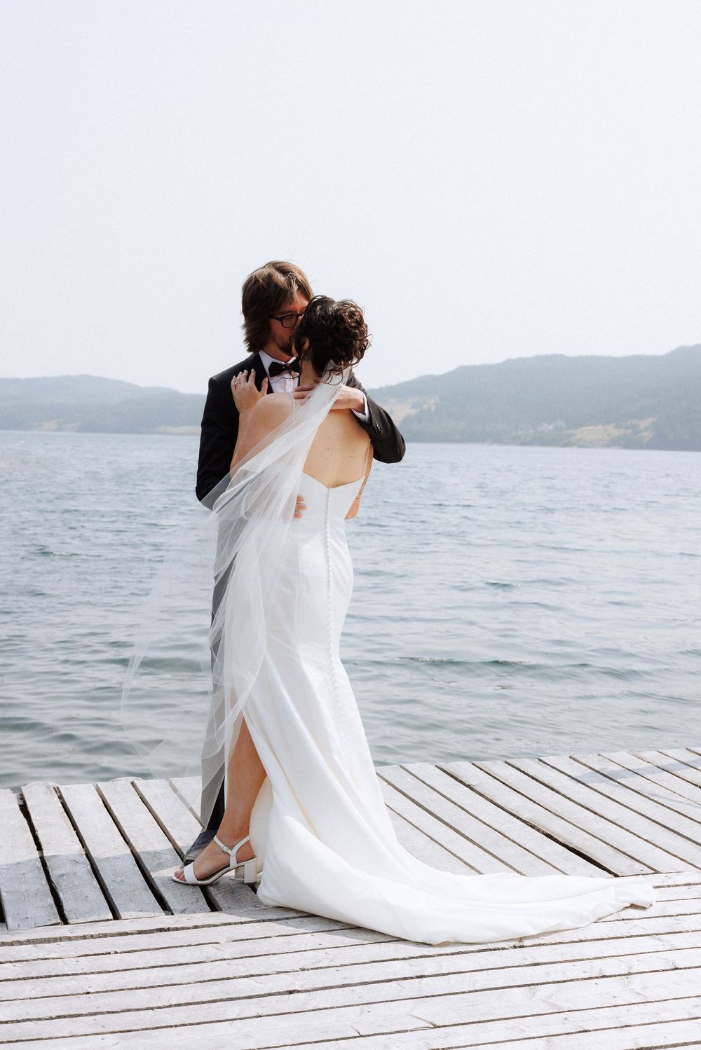 Candid bridal party photos in Trinity, Newfoundland captured by Newfoundland documentary style photographer Kaitlyn Yvette