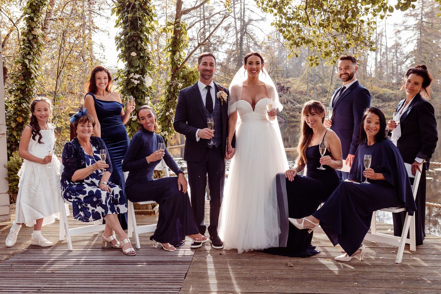 Relaxed family group photo at Lake District wedding