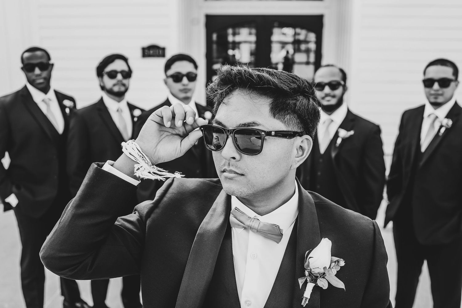 Groom and groomsmen in classic tuxedos at Firefly Gardens wedding