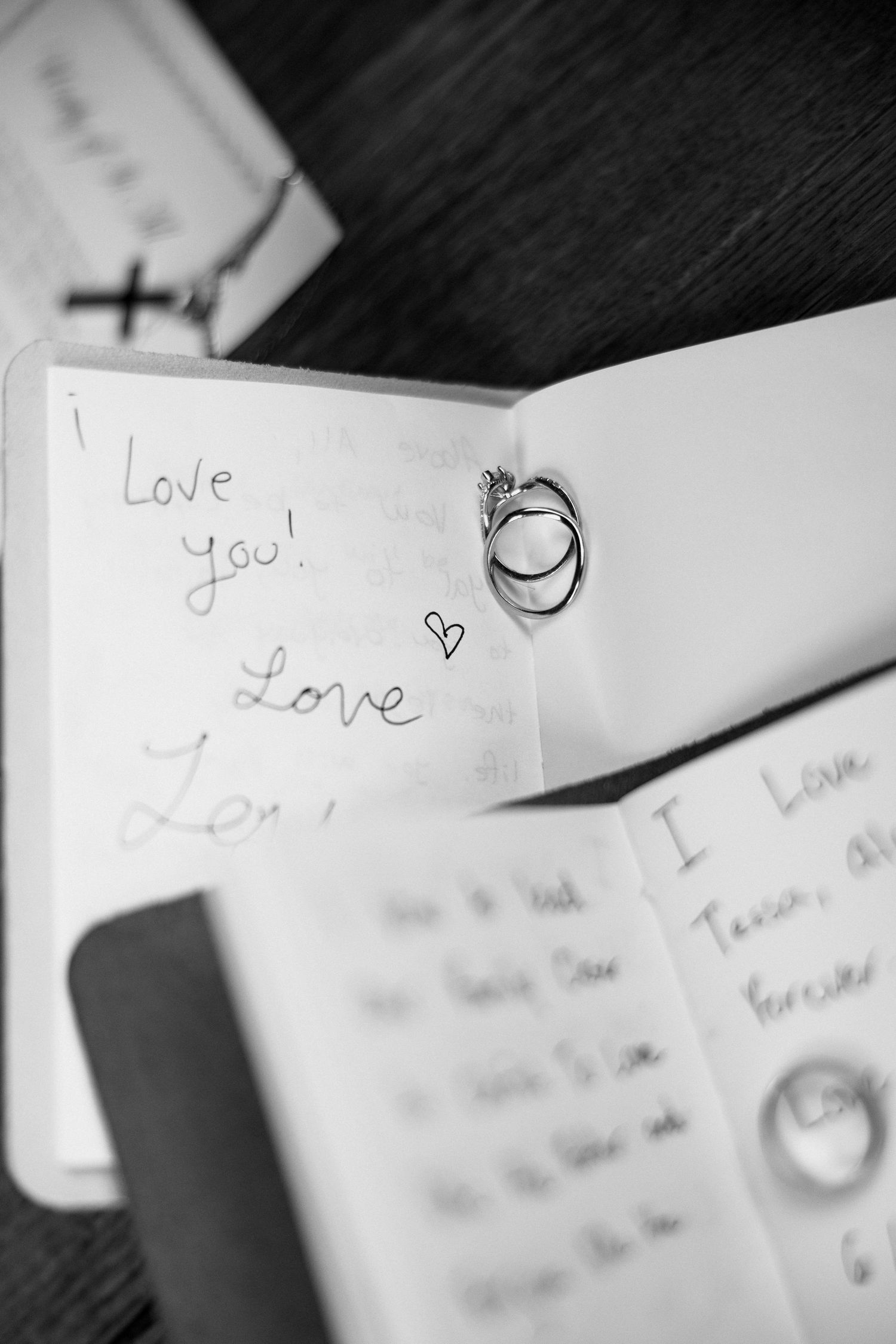 Handwritten love notes and messages on white paper with hearts and doodles in black and white.Micro wedding, elopement, intentional celebrat