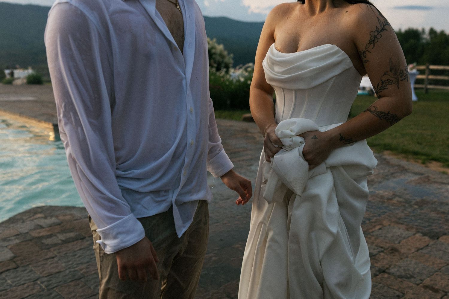 Intimate couples dancing together at sunset during outdoor wedding reception.Micro wedding, elopement, intentional celebration