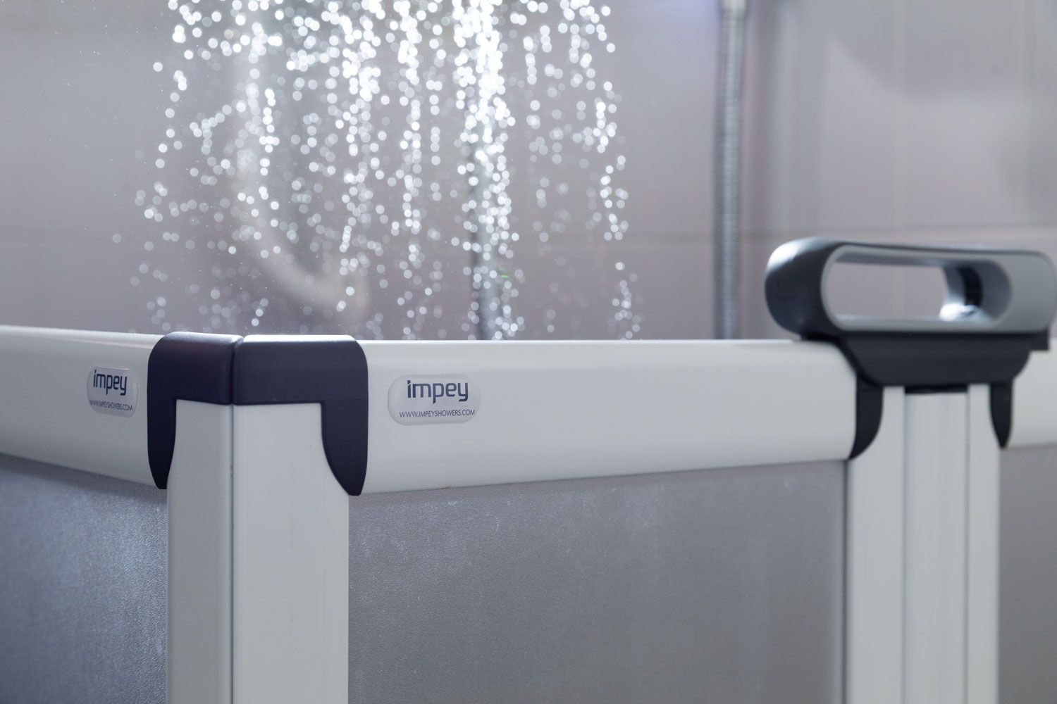 Impey shower installation photography with dramatic water lighting -2