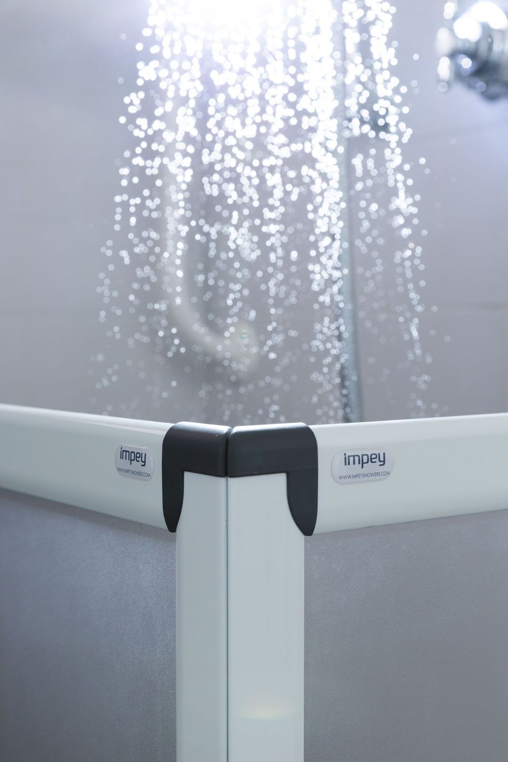 Impey shower installation photography with dramatic water lighting -6