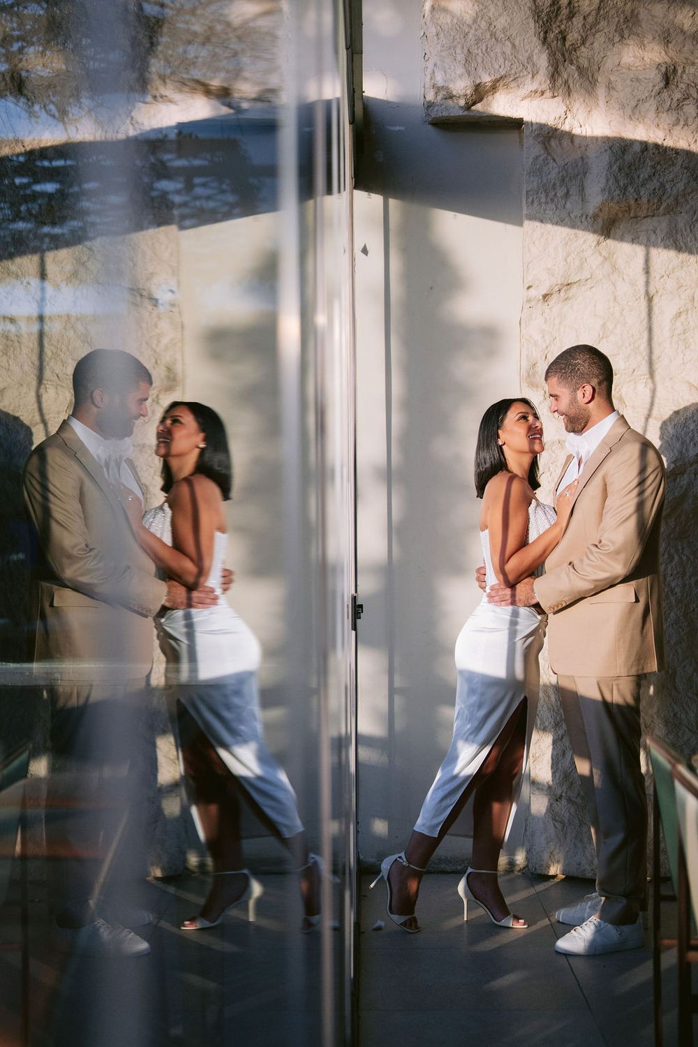 Two figures dancing romantically in a series of dreamy, artistic frames against a textured wall.