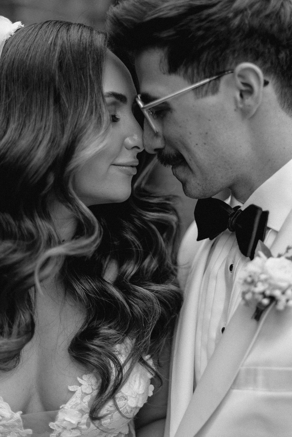 Close up view of a romantic moment in black and white photography.