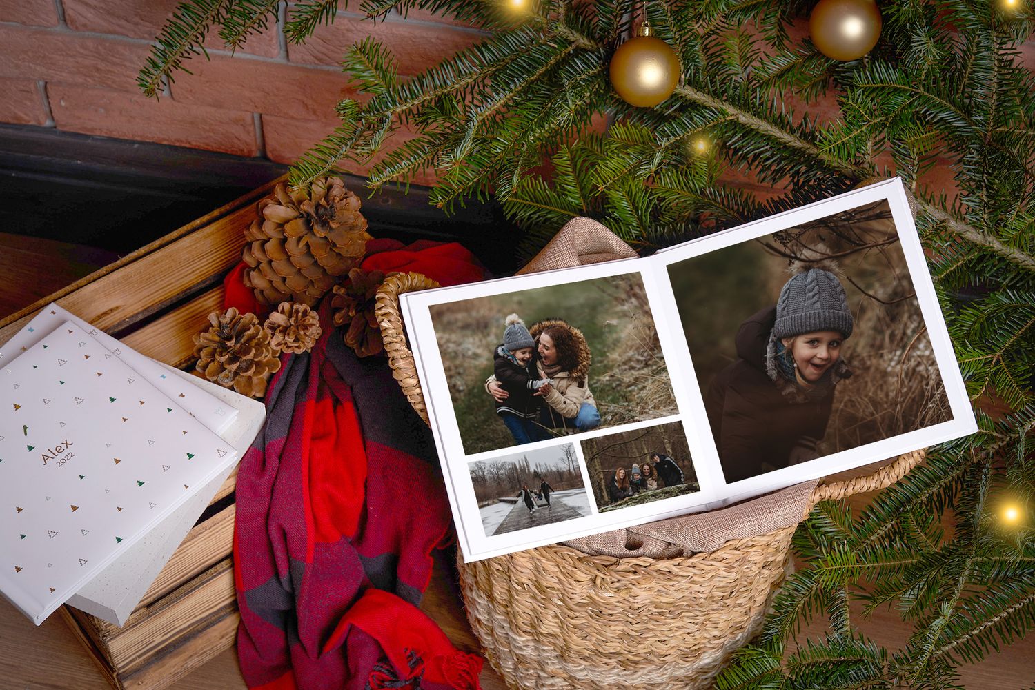 A sequence of photos being arranged under a Christmas tree with evergreen branches and gold ornaments visible.