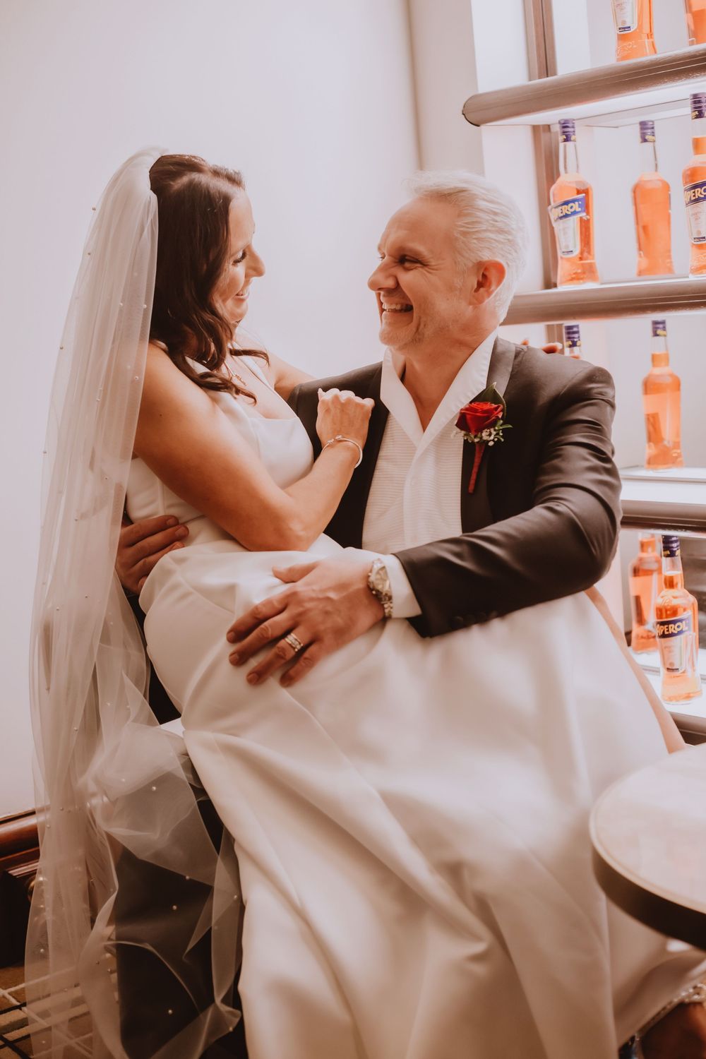 A sequence of joyful moments captured between newlyweds as they share their first dance at a wedding reception.