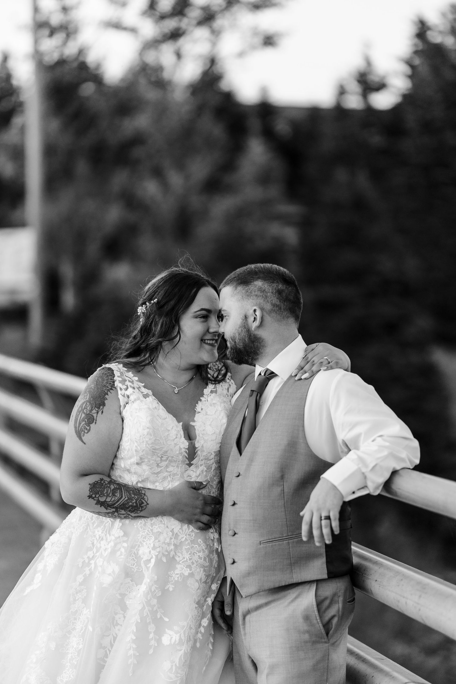 A romantic series of wedding photos showing tender moments between newlyweds on their special day in black and white.