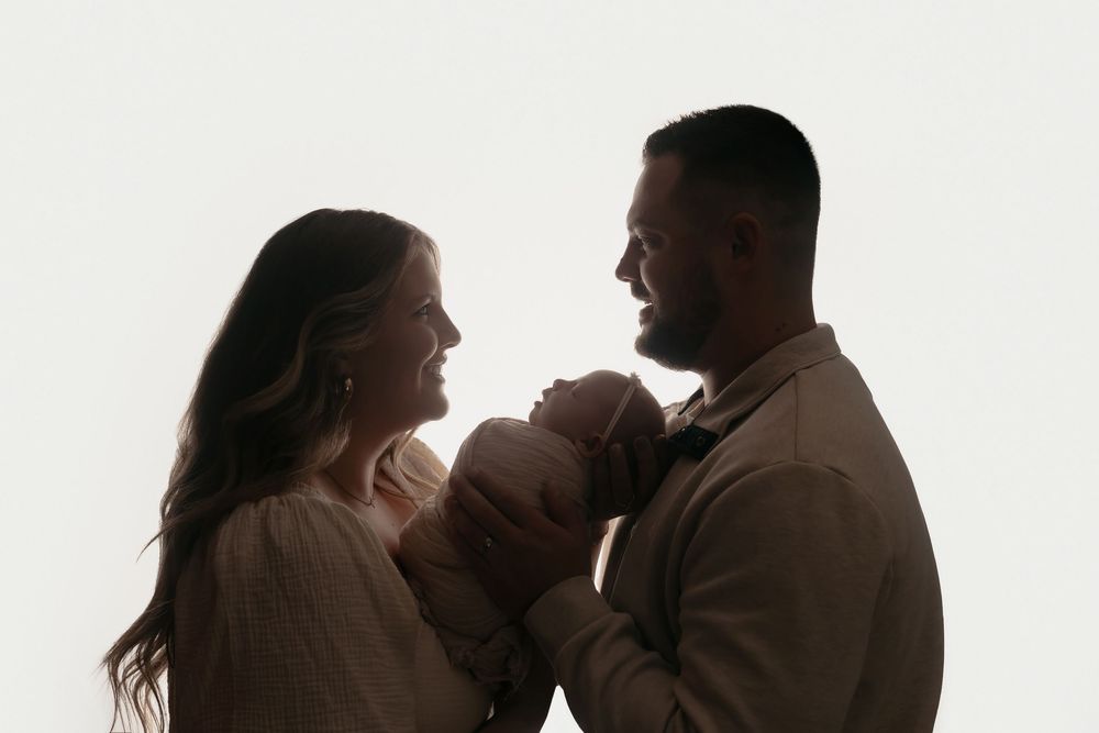 Backlit family pose, taken by Jen Knightstep, Photographer