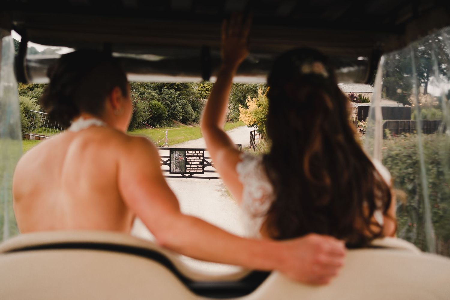 Couple dancing and sharing intimate moments in an outdoor wedding venue with beautiful lighting.