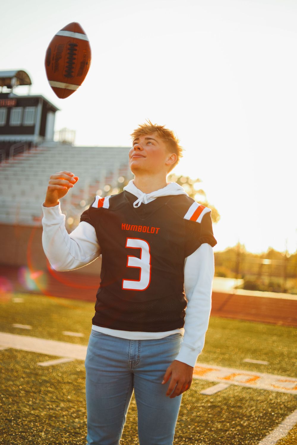 senior boy portrait football