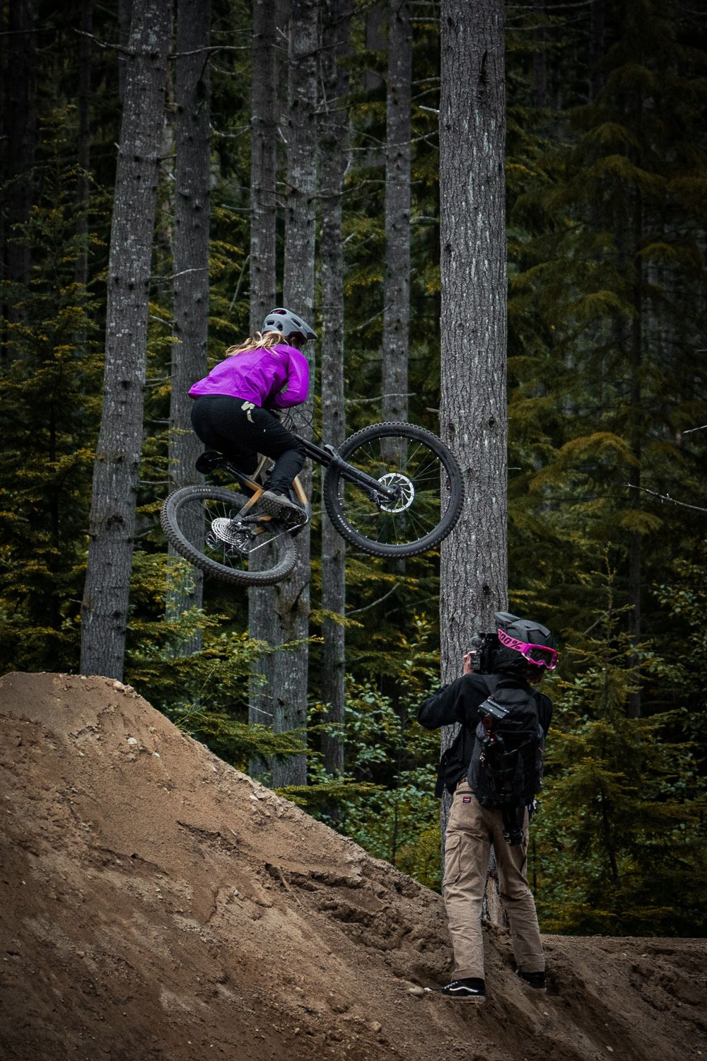 Woman jumping mountain bike