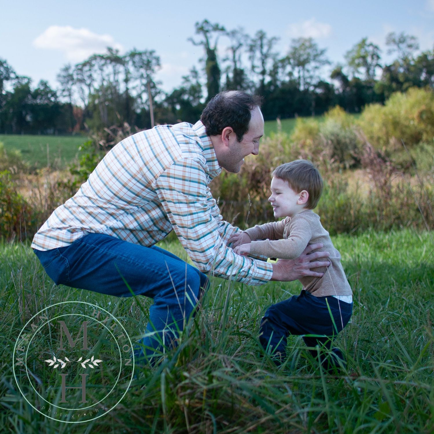 dad and toddler candid photo outside