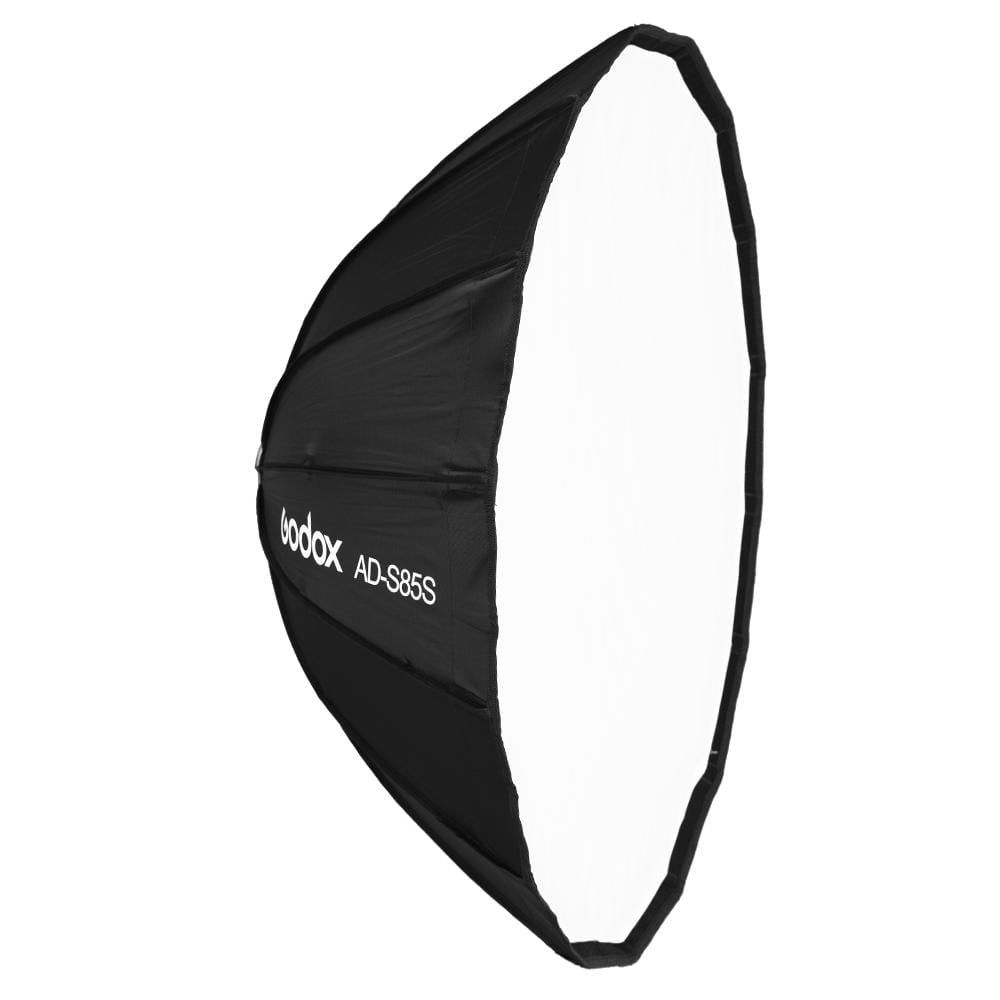 Professional photography black parabolic softbox lighting modifier with white interior for studio lighting setup.