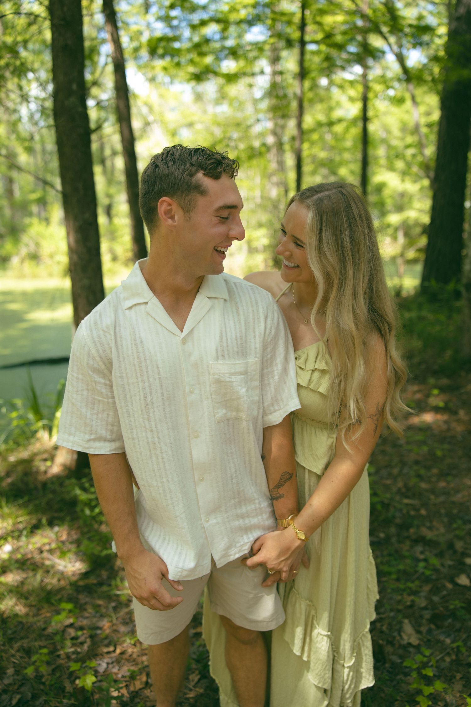 couples photoshoot nc sc lake outdoors moody romantic holding hands