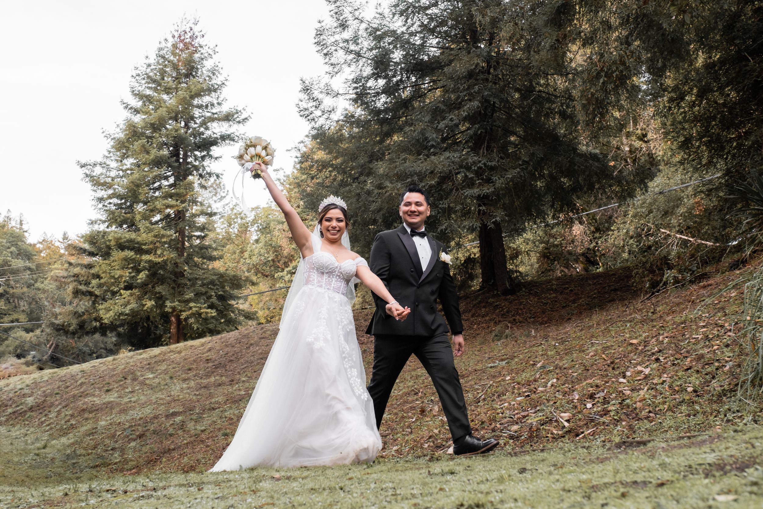 Couple during a post wedding photo shoot in the redwoods.