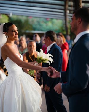 A succession of wedding reception scenes showing guests greeting each other and socializing at an elegant venue.
