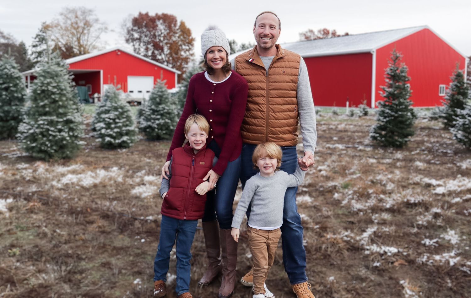 West Michigan Photographer: photo of a family sharing smiles and laughs on the beach