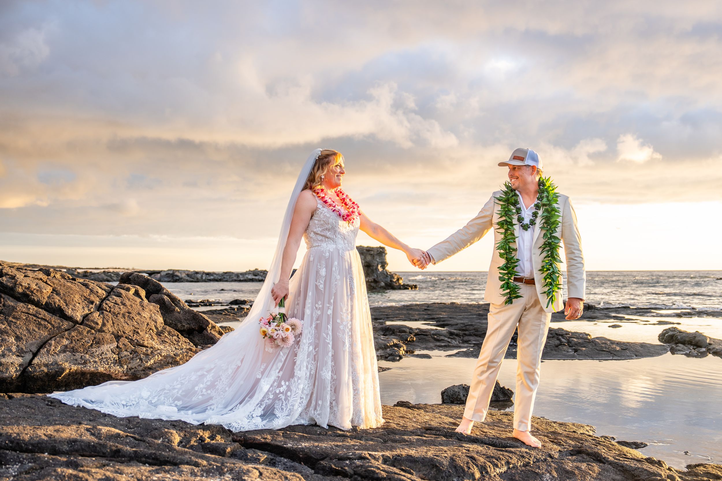 Big Island wedding & elopement photographer capturing romantic, natural moments across Hawaii. Sunset beach & adventure sessions.