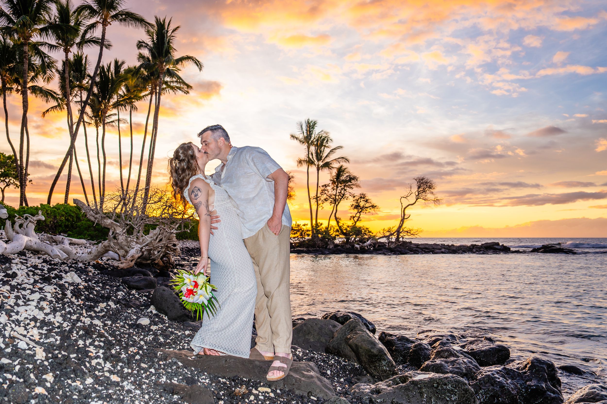 Kailua Kona Big Island wedding & elopement photographer capturing romantic, natural moments across Hawaii. Sunset beach & adventure sessions