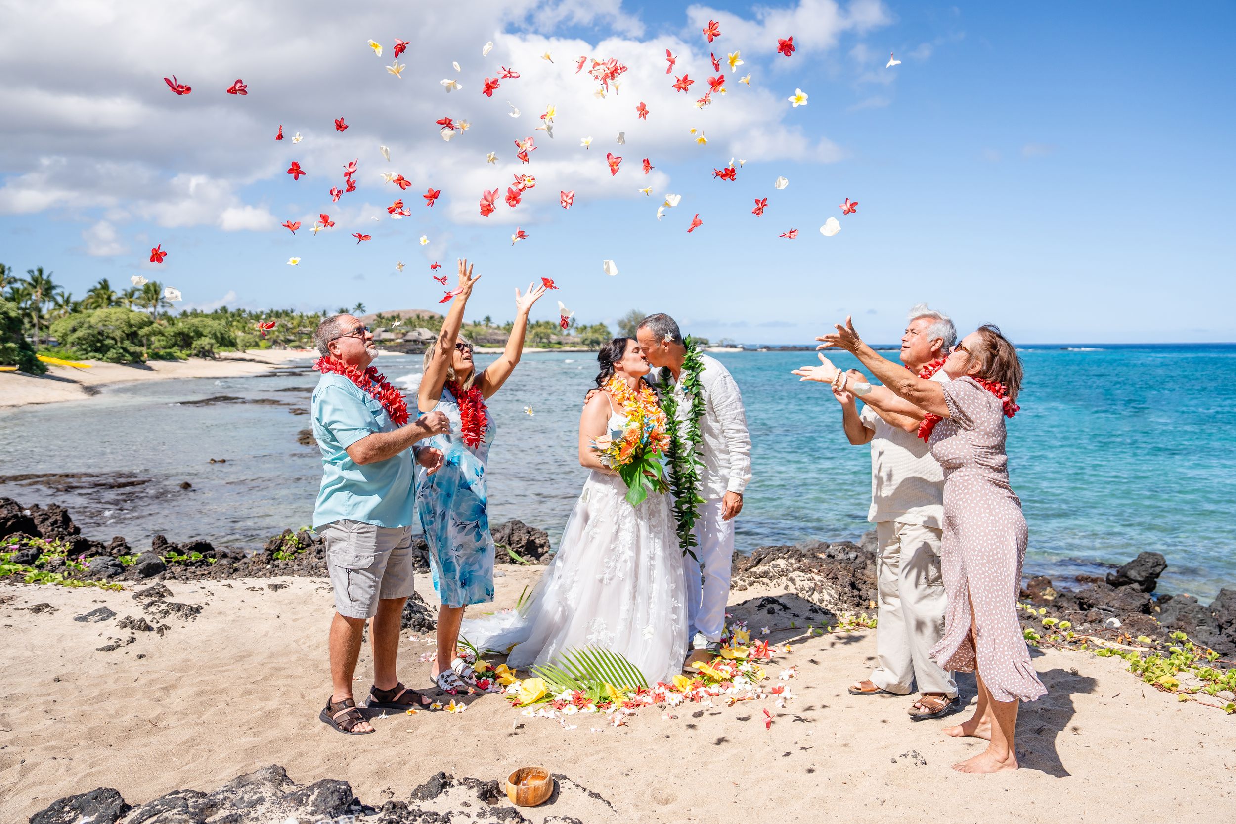 Big Island wedding & elopement photographer capturing romantic, natural moments across Hawaii. Sunset beach & adventure sessions.