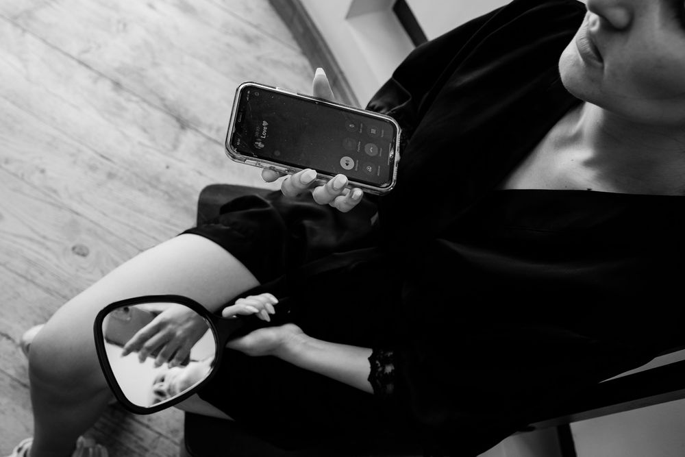 Wedding preparation details captured in elegant black and white.