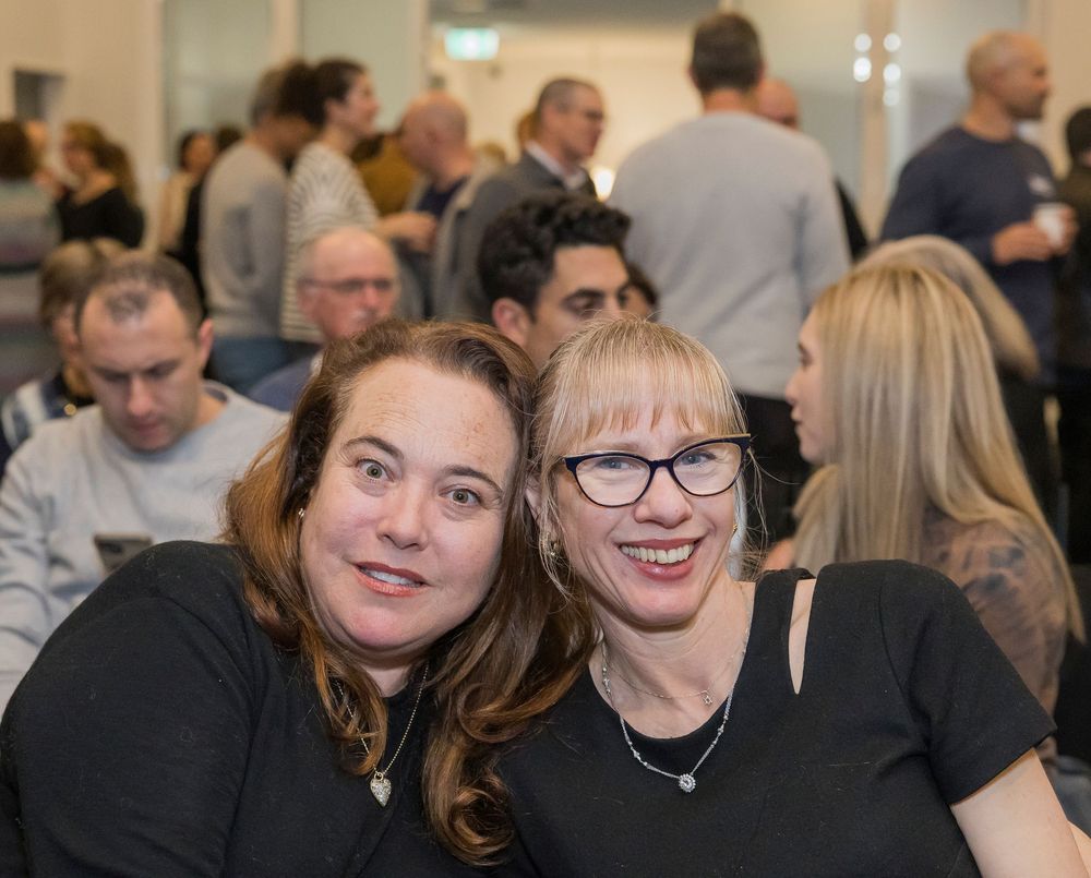 A collage of event photos showing people socializing and networking at an indoor gathering space.
