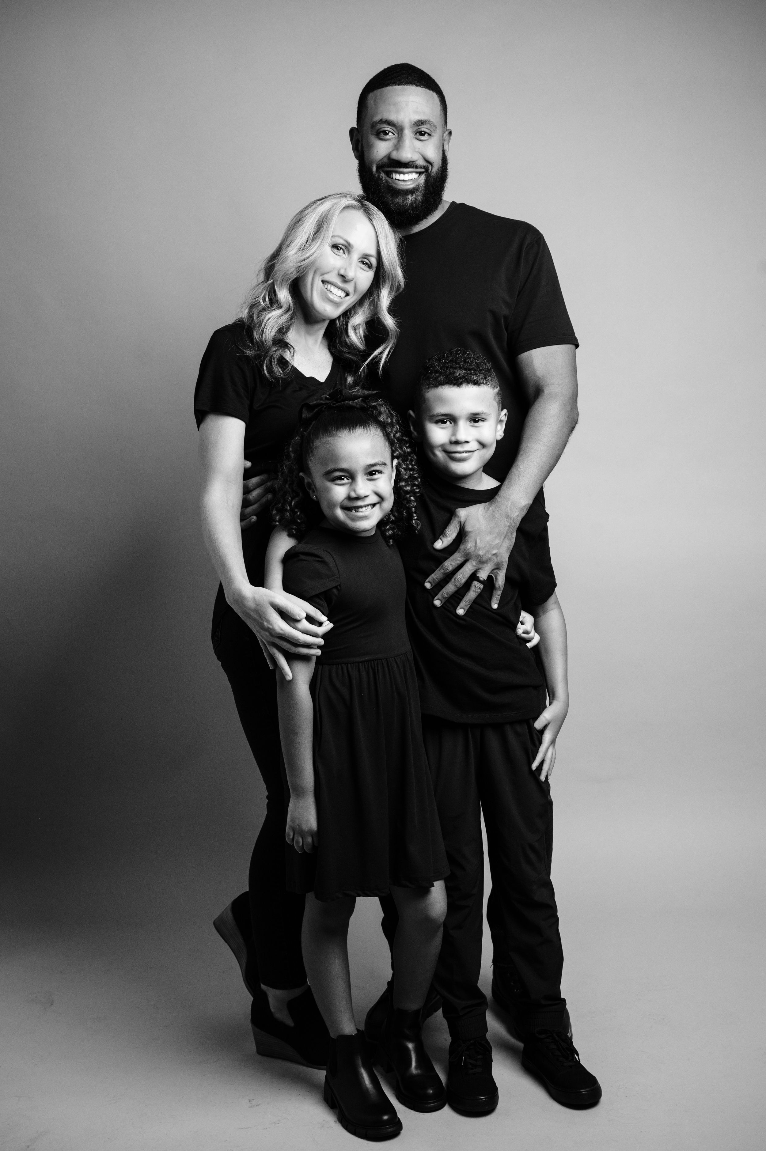 Gilbert Arizona photographer Melissa Maxwell of Jubilee Family Photography. Black and white studio family portraits.