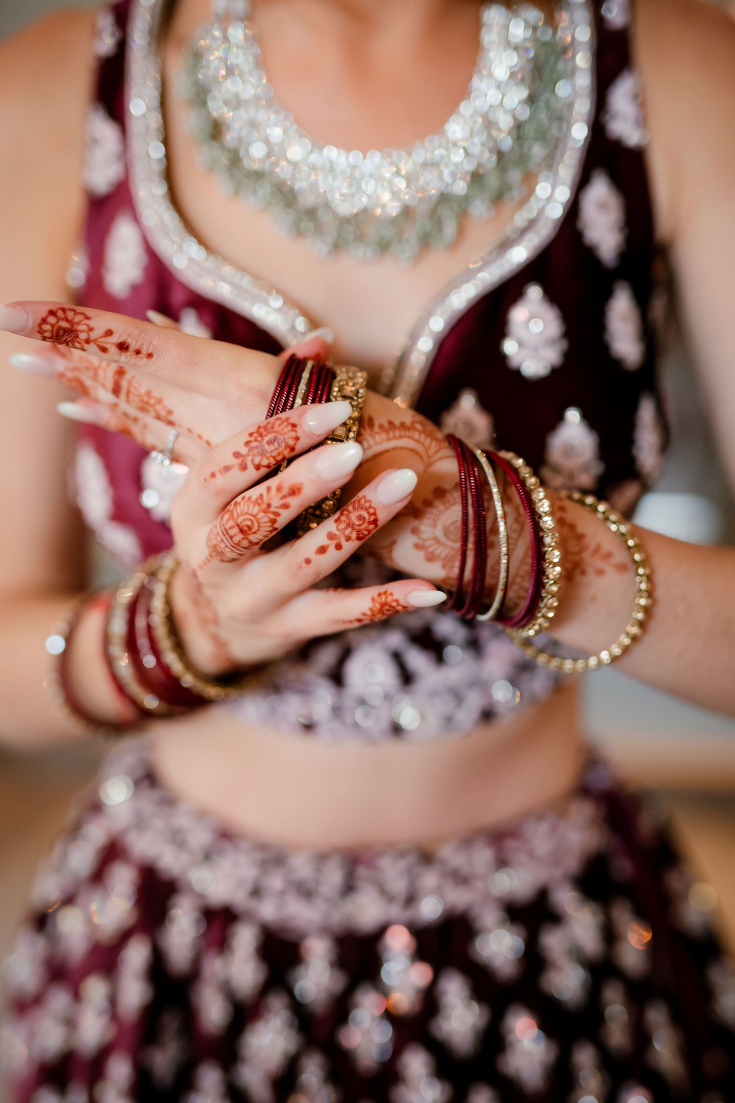 Fusion wedding reception décor at Bredenbury Court Barns with vibrant Indian colours and elegant British styling
