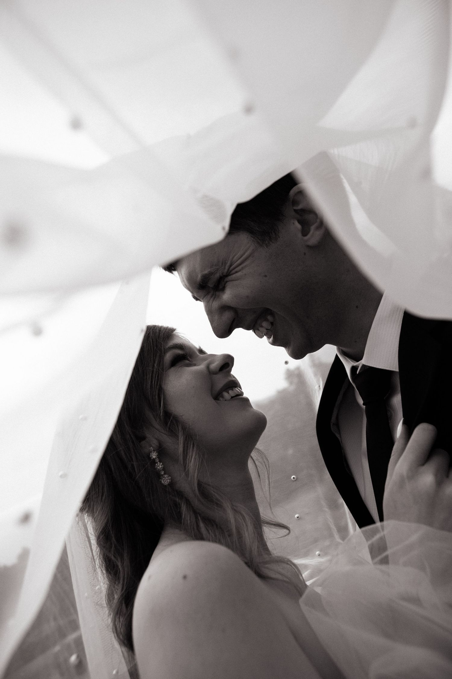 Authentic love veil shot with beautiful pearl veil detail