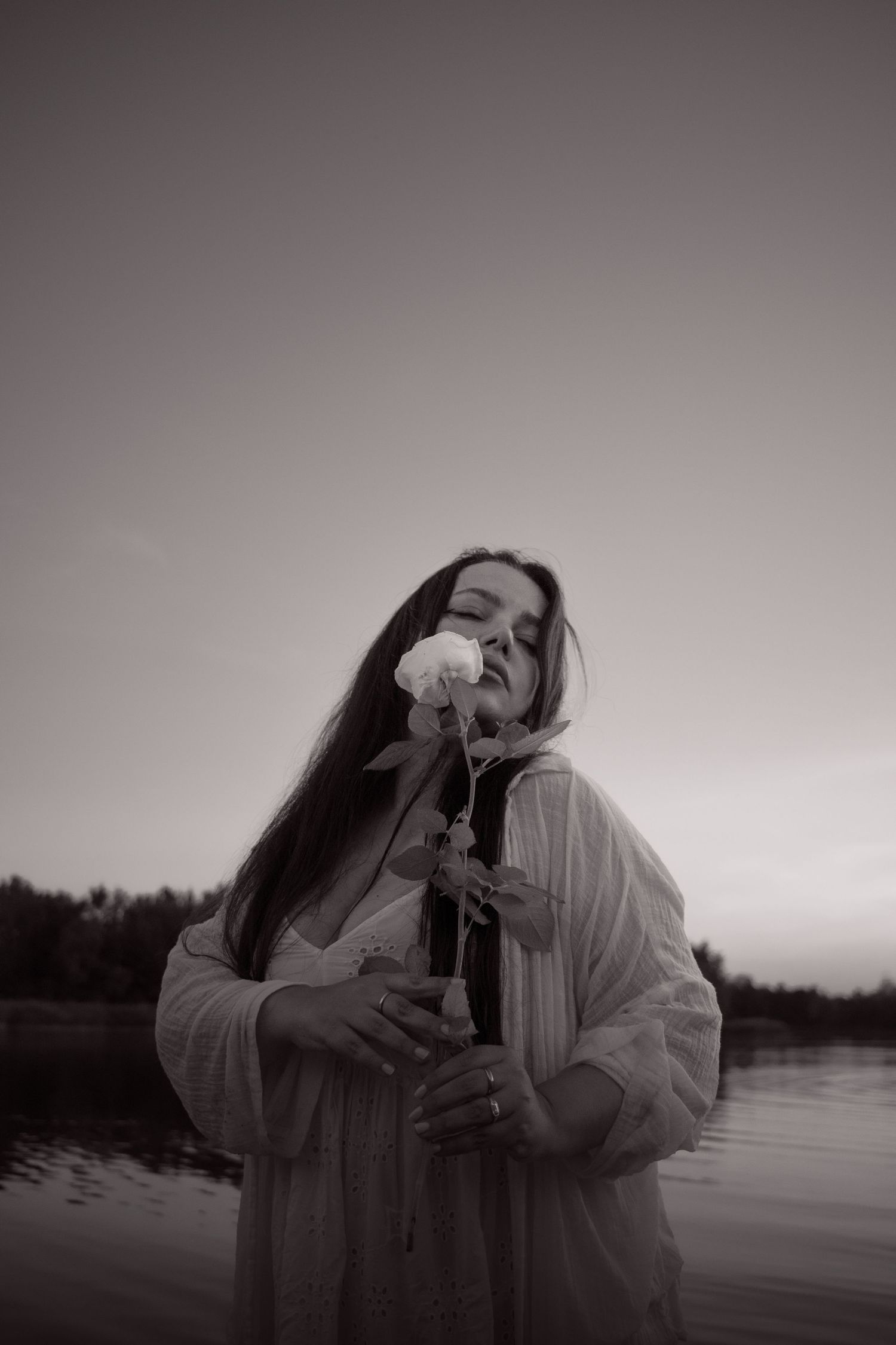 cinematic artistic portrait in hamburg during golden hour in black and white