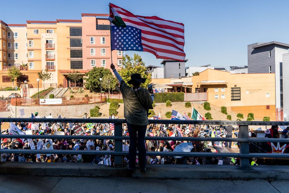 An upside down American flag is seen during the “No Kings” protest in Los Angeles, California in October 2025.