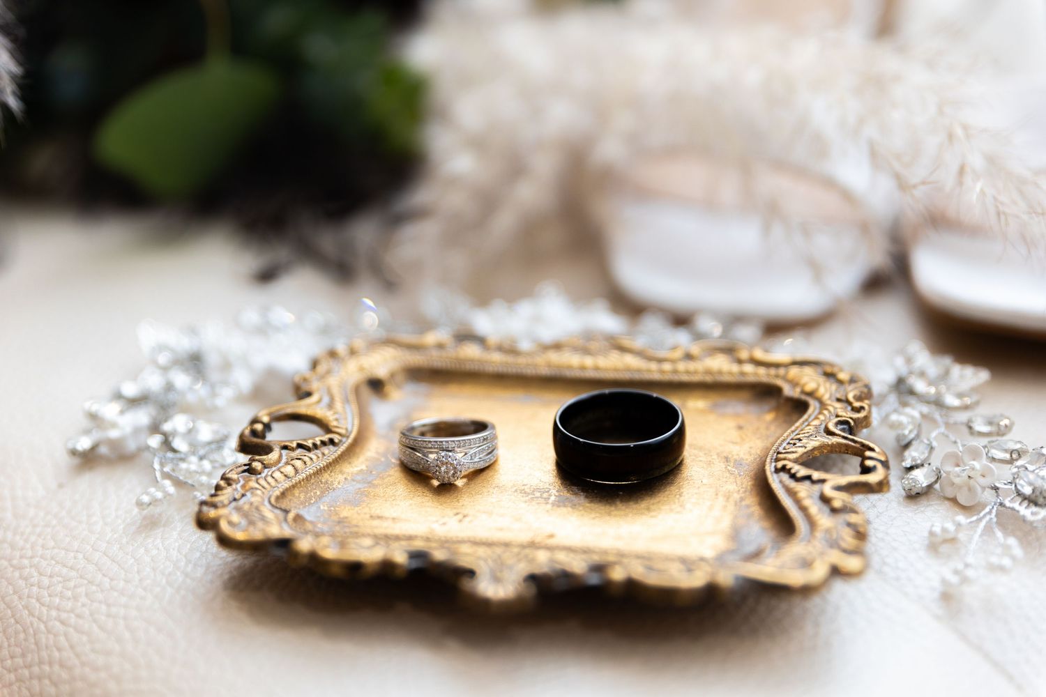 Elegant gold vintage frames with ornate details displayed in a row against a white background.