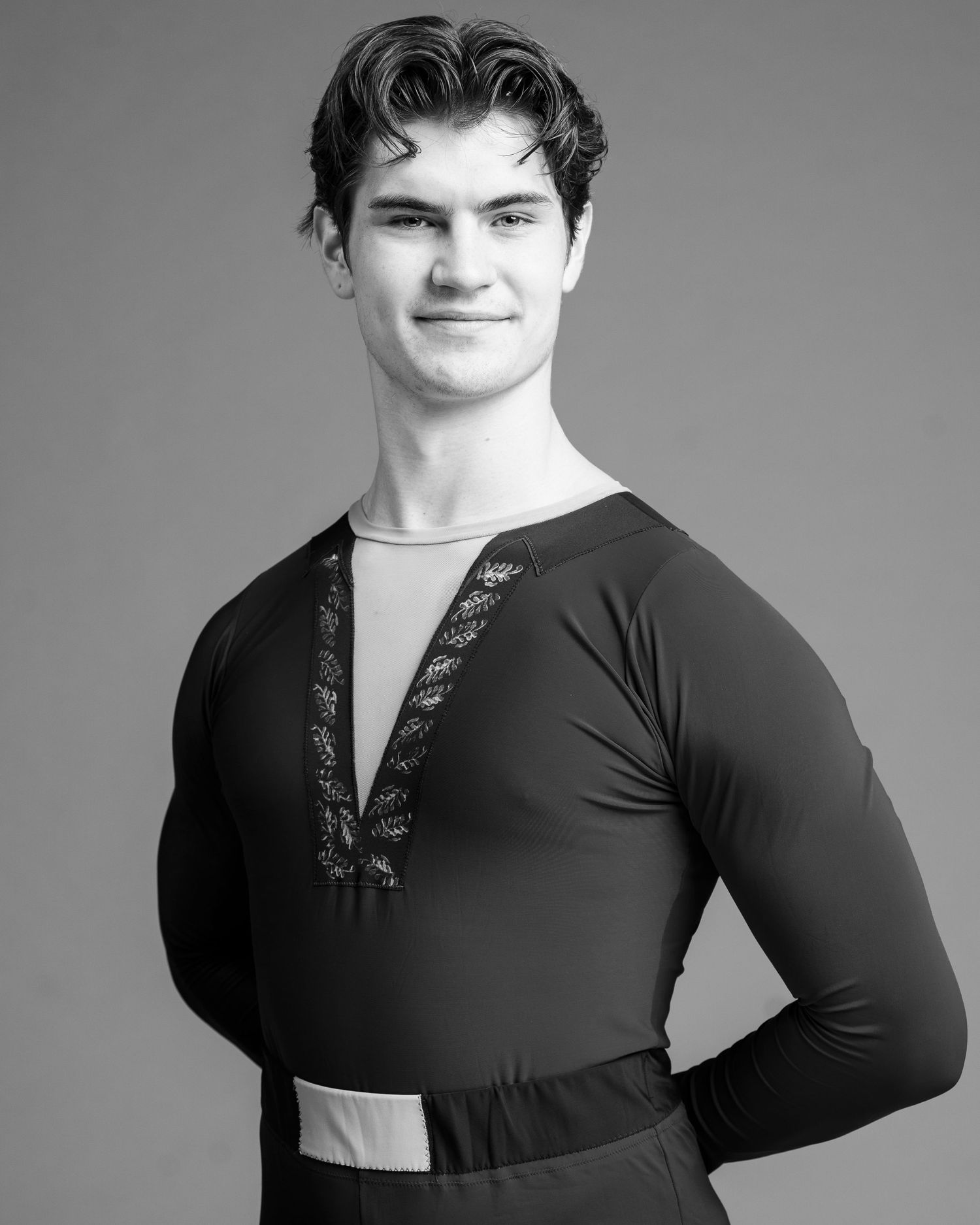 Chicago male ballet professional dancer headshot for audition with classic black and white edit and clean background.