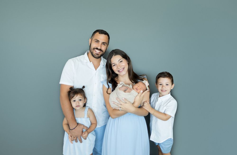 A series of six casual family photos showing tender moments and poses against a light blue background.