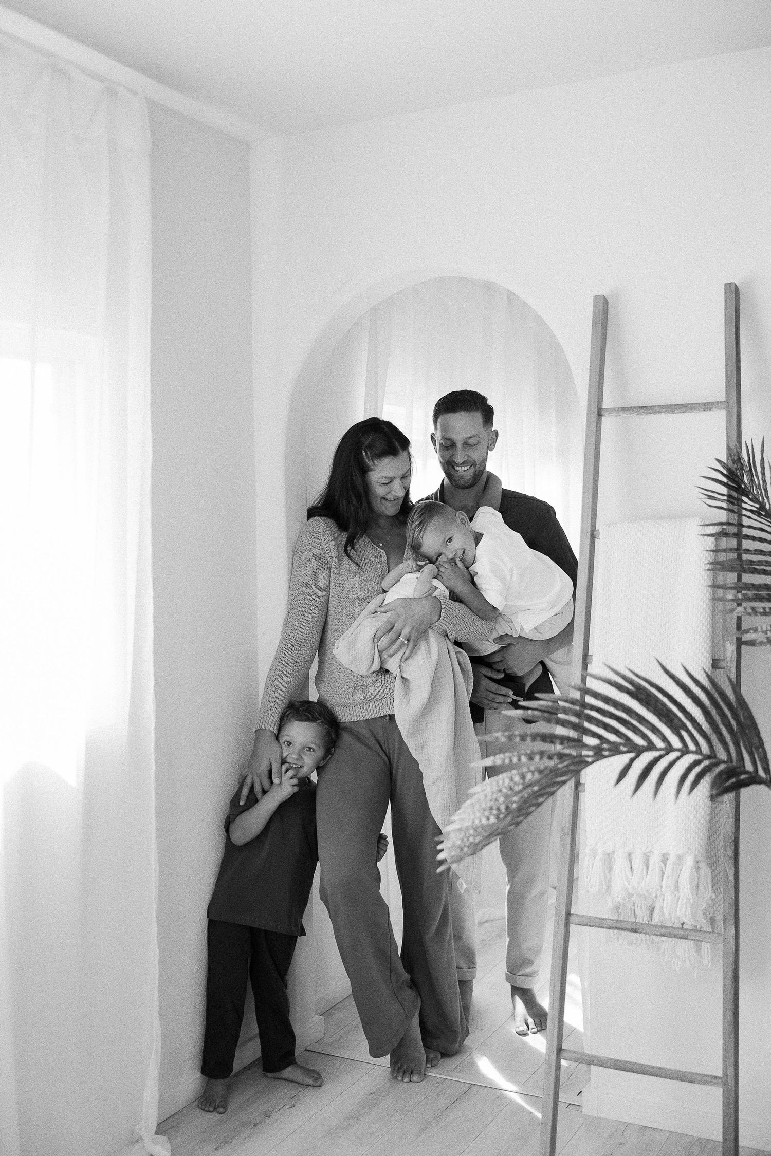 Family photo outfits indoor studio in Orange County with soft neutral styling