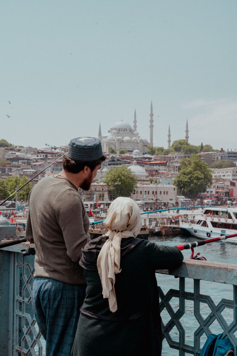View of two locals looking at the mosque Istanbul, Turkey
