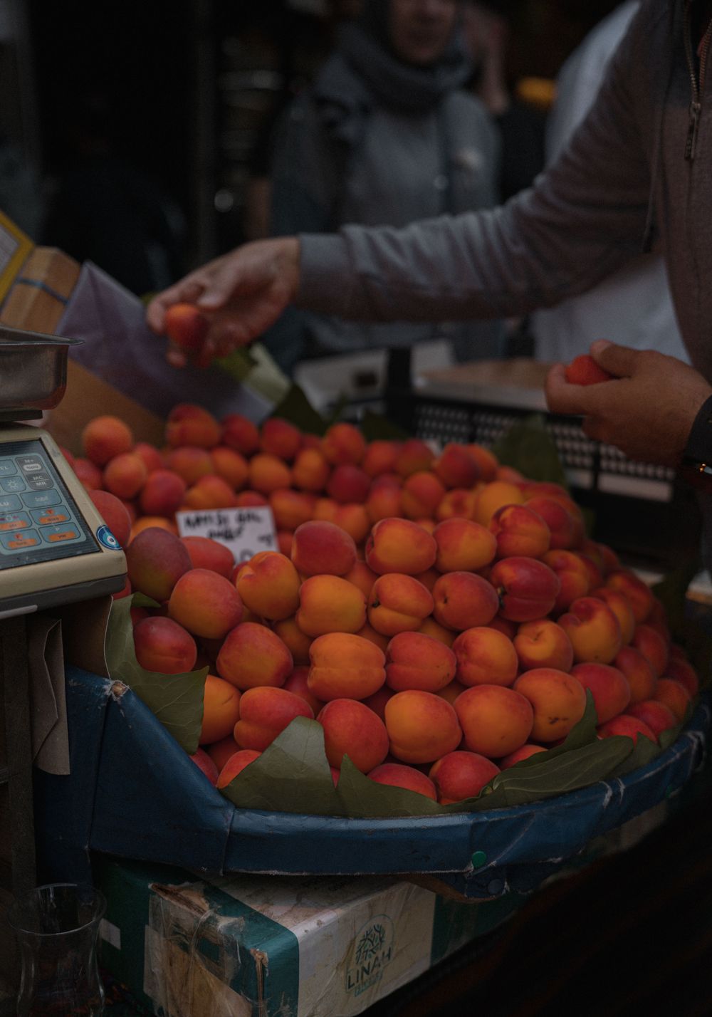 Peaches being served in market, Istanbul, Turkey