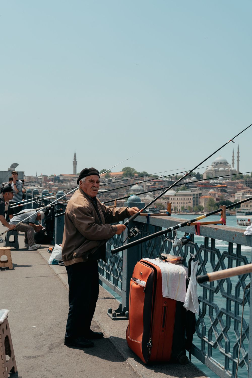 Local fisherman on bridge in Istanbul, Turkey